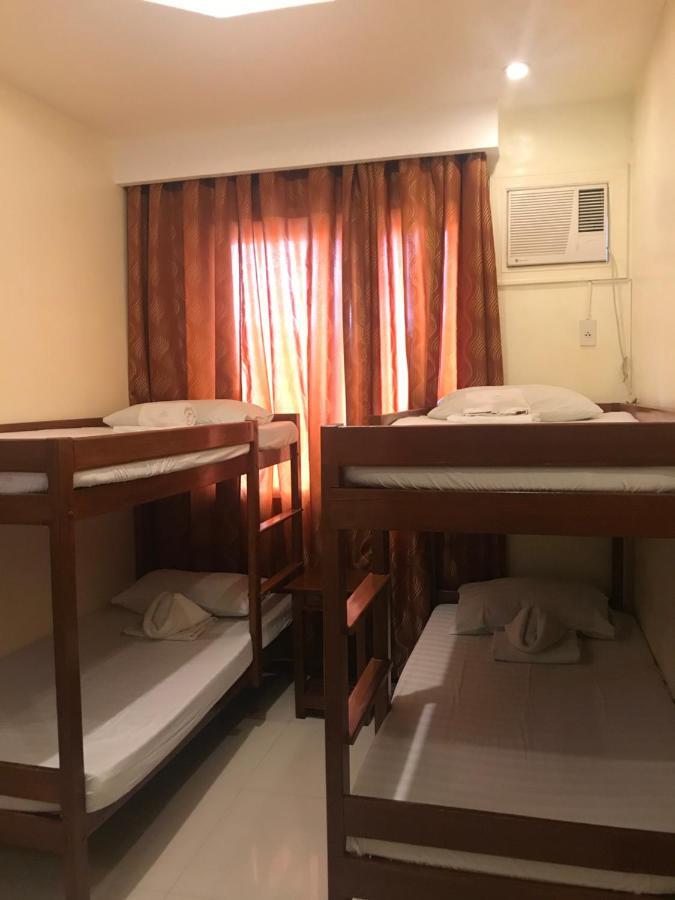 Aquari Travellers Inn Пуэрто-Принцеса Экстерьер фото