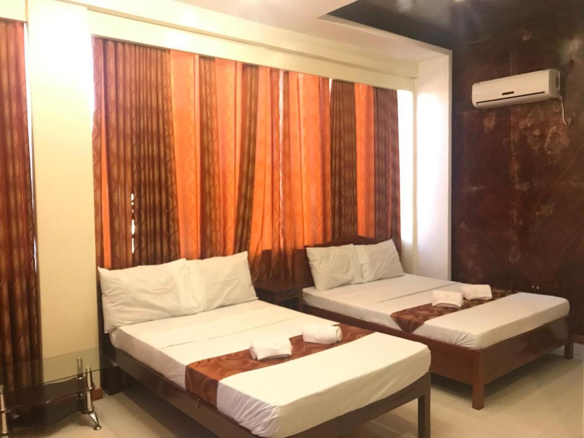 Aquari Travellers Inn Пуэрто-Принцеса Экстерьер фото